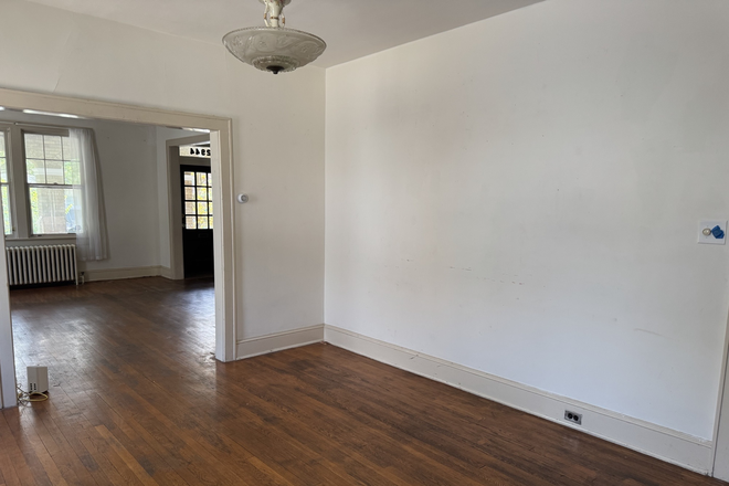 Living Room and DIning Room - LargeTownhome  7 Bedroom 4.5 Baths 2 Kitchens with Parking Available August 1 2026.