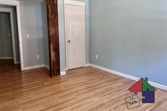 Closet in bedroom & wooden pillar/beam, stone browning pic - 215 Pearl Street unit 3 (shared housing with 2 others), looking for a Subletter (spring 2026)