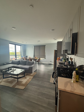 Living Room / Kitchen - Private bedroom and bathroom close to HBS Campus Apartments