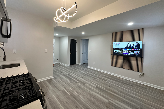 Living Room - Private, Fully Furnished Suite - Private kitchen, washer, wifi + more! Apartments