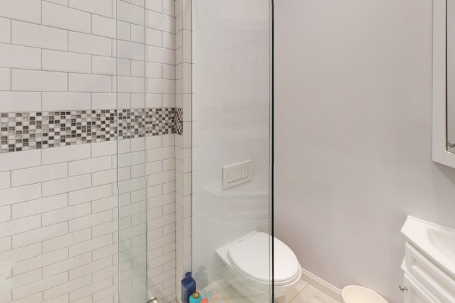 bath in BR on 3rd level - Stunning, newly renovated three-level townhouse with parking 7 minute walk to Harvard Yard