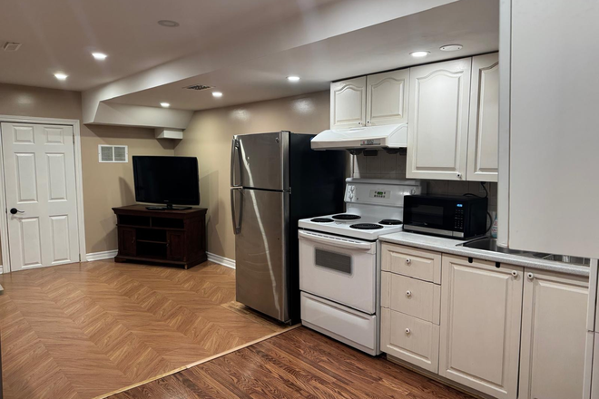 Kitchen view from apartment entrance - Spacious Furnished Apartment in quiet neighbourhood