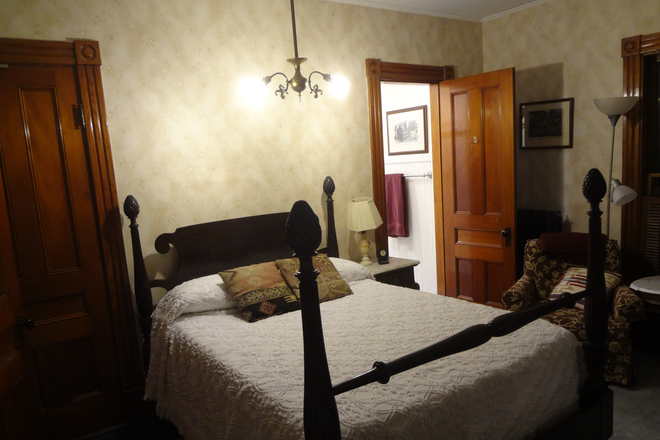 Second floor bedroom, door to bathroom - The brick castle House