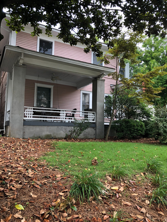 1a. View from Euclid Ave with large front porch swing on porch left and Magnolia tree - L5P/Candler Park Apt 1