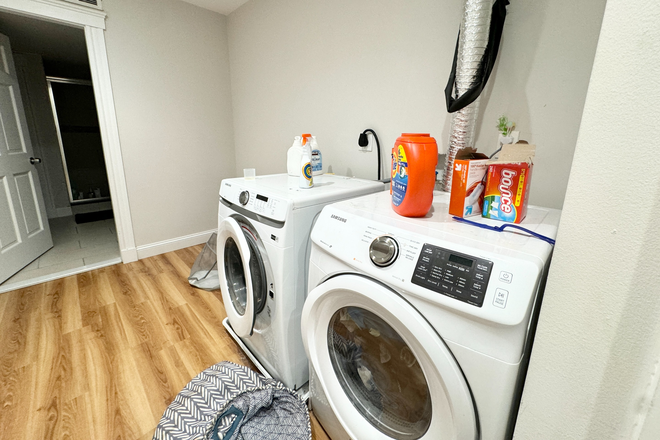 Laundry - Newly renovated 4-bedroom, 2-bath apartment located on Grant St in Dorchester.