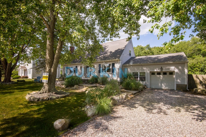 Street View - Eastward Look Contemporary Home with Open Living Spaces, Deck, and Patio Areas