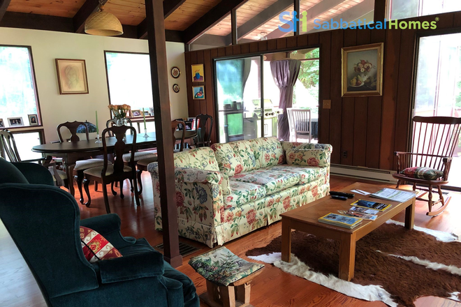 Open living room/dining room - Short term: Beautiful fully furnished single family home in a peaceful wooded area