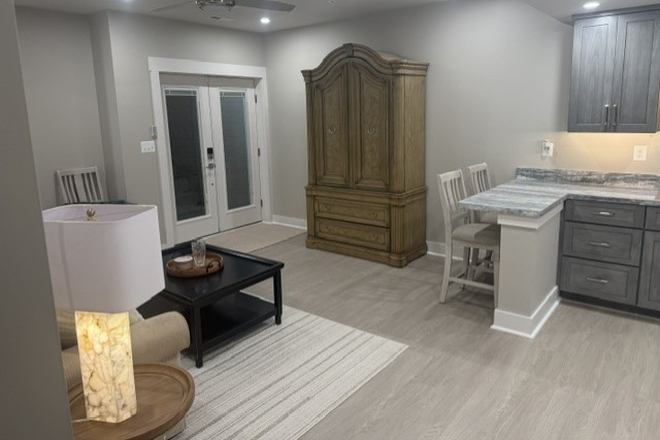 View of living room and eating area. - Quiet Water Community Apartment