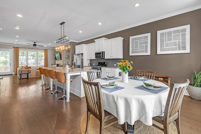 Dining room view to Kitchen - Luxury 4BR Townhome by Kensington MARTA – Easy Commute to Emory & GSU