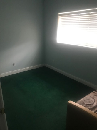 Bedroom window - PRIVATE ROOM FOR RENT. FREE UTILITIES! House
