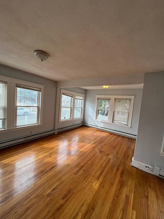 living room/dining room - 3 bedroom apartment on Goldsmith Ave Medford for September!