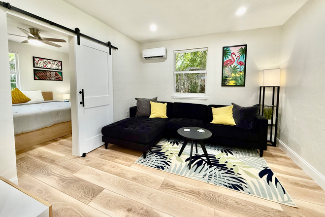 Living room - Modern, bright, private furnished 1/1 cottage in downtown Coral Gables close to University of Miami. Apartments