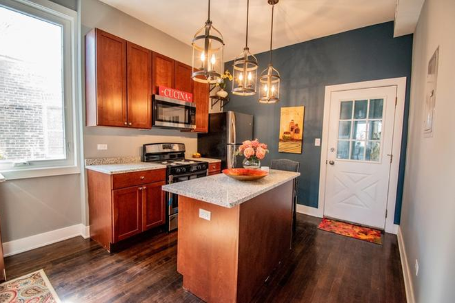Kitchen - East Humboldt Park Area, lovely and friendly neighbors (+ Office Space)! Close to Bus and Train! Apartments