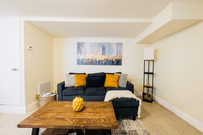 Living Room - Luxury, Pet-Friendly 1B/1B Apartment Available Near JHU Shuttle Stop & Penn Station