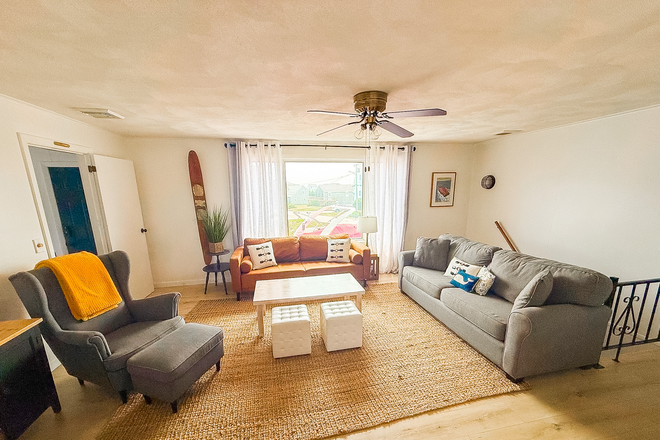 Living Room with Waterview - Massive Flat Yard with views of Roger Wheeler House