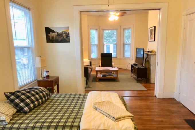 living - Central sq apartment in small building, wood floor