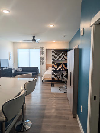 Queen murphy bed - down - Fully furnished condo at The Edge in downtown IC. Includes Internet, Utilities & Parking