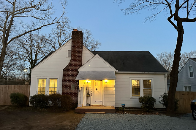 house at night - Available May 2025 for 25-26 School Year, Newly Remodeled 4 BR 2 Bath Home -  NEXT TO WFU!