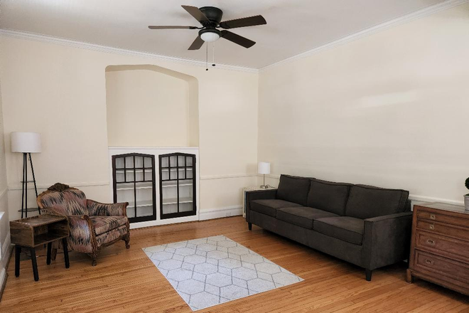 Living Room - Furnished 2 Bedroom Apartment, Walkable to Danforth Campus - Utilities Included