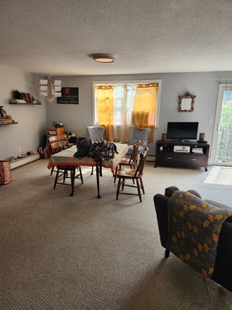 shared living space - $1200 East Side, private room and bathroom plus parking, shared condo