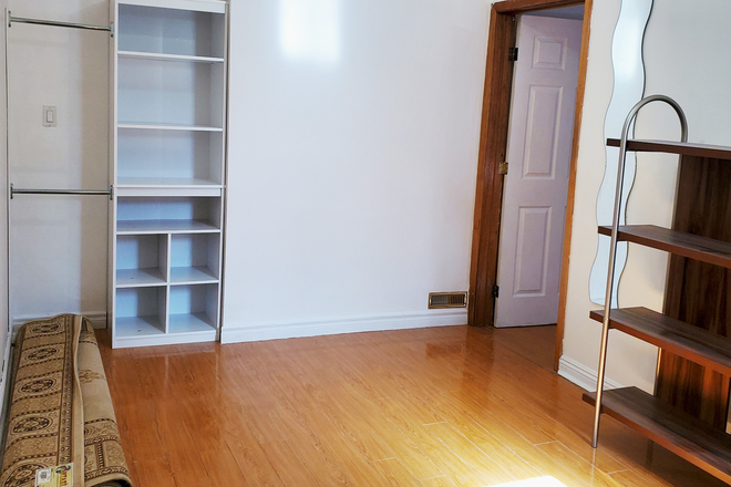 Livingroom - Facing Bedroom Entrance - Brightly Lit Private Entrance 1 Bdrm Partially furnished Main Flr Apt Split Level (2 km from UofT)