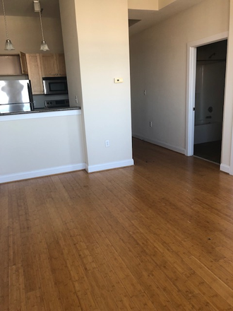 #504 - living room (angle 1) 1BD - Stylish Spaces & Scenic Views – 1 & 2 Bedroom Homes at Eagle Mill Towers