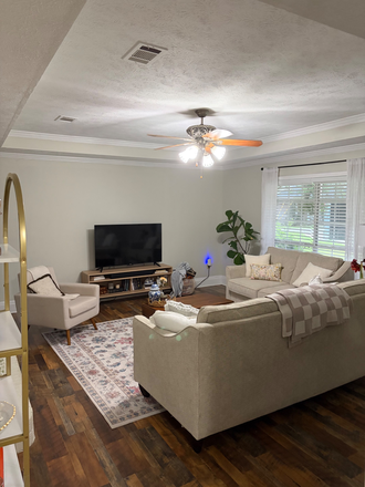 Living room-a new couch will be moved in as old roommate moves out - 3 Bedroom House in Search of a Roommate!