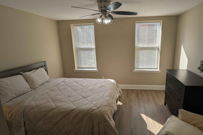 Larger bedroom - Your Own Space! Private Room & Bath in Shared Home. Steps from Hospital. Flexible Furnishing