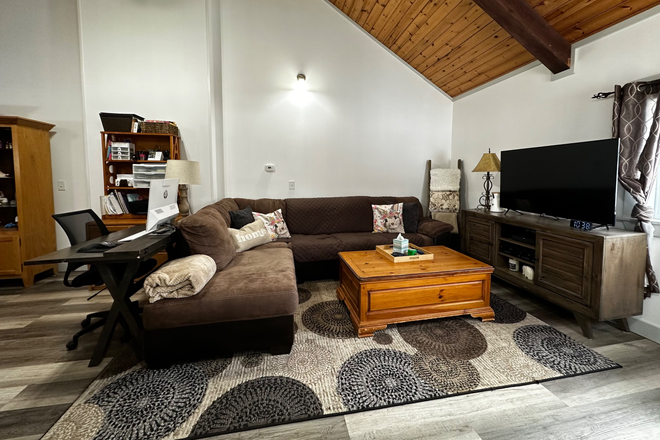 Livingroom - One bedroom, single occupancy apartment.