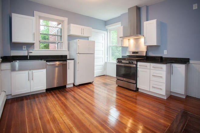 Kitchen - Versatile 3/4 Bedroom w/ Sleek Kitchen, Large Windows & Hardwood Floors!