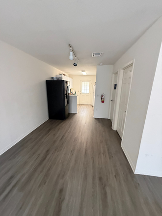 common area kitchen and living room/dining room - I'll pay half of your first month's rent! I'm graduating and needing to move out soon. Apartments