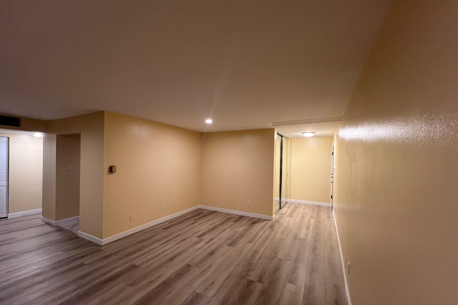 View of the living room and the entry way + closet - Heart-of-Boulder gem: freshly renovated 2BR 2 BATH Condo