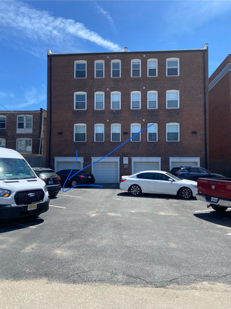Back parking lot - Quadrangle Housing Apartments