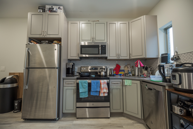 kitchen shown as furnished - Room with a private bath in a 3b3b unit for a male student, available 3/1/26 Apartments