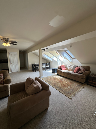 Living room - Riverwatch Condo, top floor w/ washer and dryer