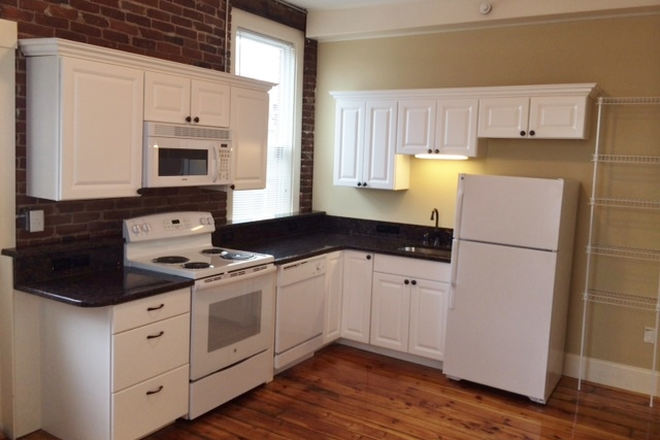 Image 3151435 - Avail July 1, 2026 Renovated  apartment in the center of town, large windows, eat in granite kitchen
