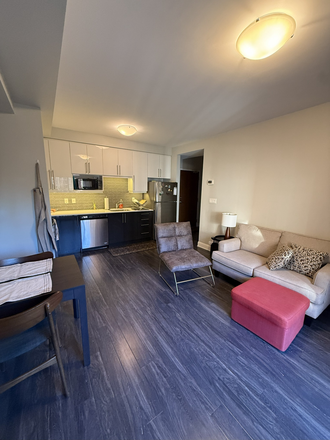 Living room + kitchen - 1 Furnished Bedroom in Fully Furnished 2 Bedroom apartment 15 minute walk from Campus