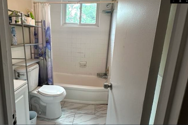 Bathroom - Spacious 5-Room House with Front & Backyard Near UMD