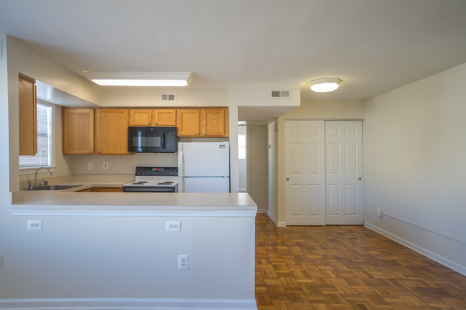 Living Room/ Kitchen - Taylor Luxury Apartments Rosslyn (Apt is Furnished, you just need to bring your bedroom furniture