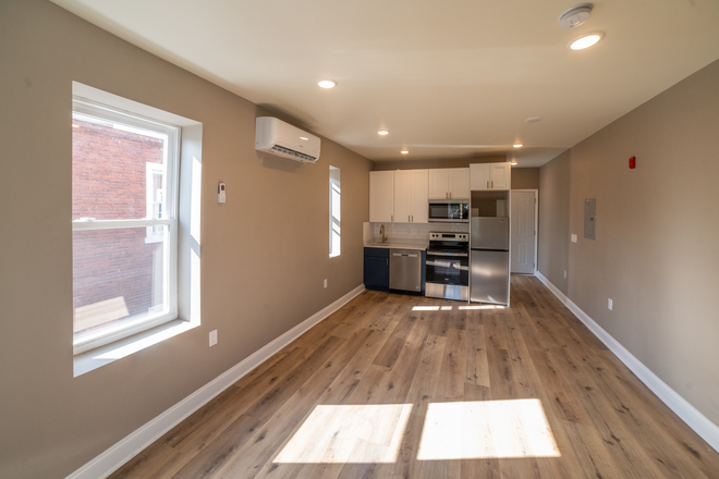 Living Room - Gorgeous Studio With ROOF DECK A Block From Campus Apartments