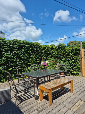 Shared deck. - Lovely 1 bedroom, light and bright garden suite with shared back deck space.