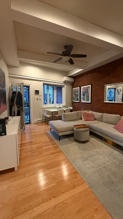 Living room with high ceilings - Furnished North End apartment with own entrance and private patio