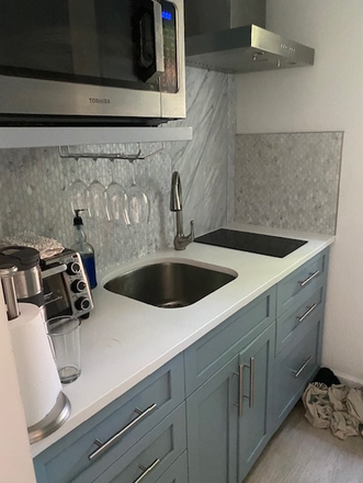 kitchen - Cottage in a Paradise Garden Apartments