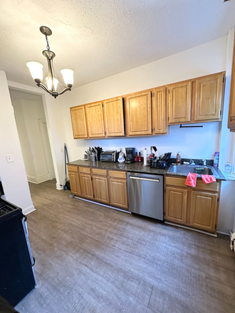 Kitchen - 4 bedroom on Tremont St. w/ tons of natural sunlight & laundry in unit