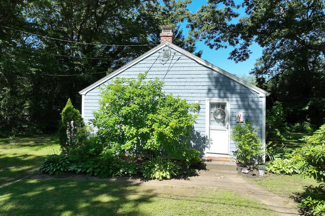 Side view - main entry door, next to driveway - 60 Pettaquamscutt Lake Road Narragansett UTILITIES INCLUDED* Quiet Neighborhood Lake/Beach House