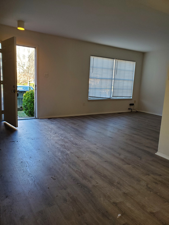 New floors main level! - STEPS TO CAMPUS!! Townhome