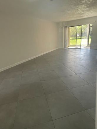 Living Room - 3/2 WINDWOOD Lakefront Nature Preserve First Floor Condo Newly Renovated with Luxury Finishes