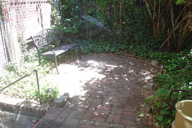 back - No fee! Central sq garden level studio. all utilities included. No stove Apartments