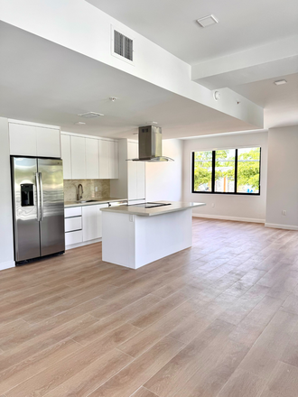 Living Room and Kitchen - 2nd Floor - Luxury Student Housing - 4 Bed 4 Bath - 3 Story Townhouse