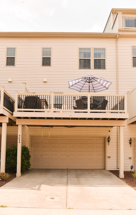 Back of house and garage - 3br/2.5ba Canton Townhome Near Campus